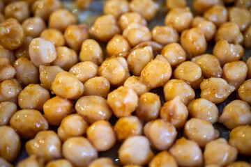 Orange peas in a pot with species