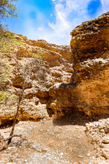 It's Sesriem Canyon, a natural canyon carved by the Tsauchab rivier in the sedimentary rock, Namibia