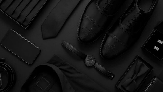 Elegant man clothes concept. Set of black wardobe and accessories for official party evening meeting