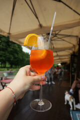 Cocktail spritz aperol on the summer terrace of the restaurant