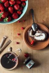 flat lay with strawberry and chocolate cake
