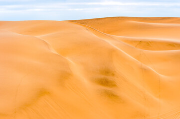 Fototapeta na wymiar It's Spectacular view of the Sand dunes at the Namib-Naukluft National Park, Namibia