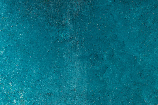 grungy wall background paited blue with white patterns