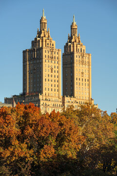 New York City, NY, USA - November 3, 2018: Autumn sunrise between the two towers of the luxury San Remo Building (National Registry of Historic Places) viewed from Central Park. Upper West Side