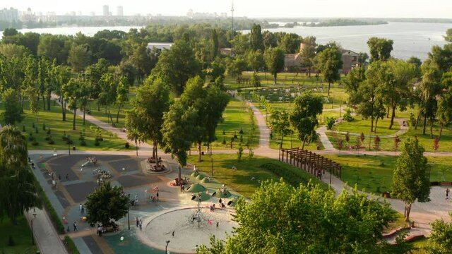 Aerial view. City park with green trees. People are walking in the city park in Kiev, Ukraine