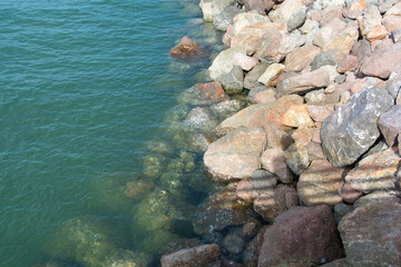 Rock jetty beach at  Hua-Hin District, Thailand