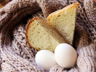 Fresh bread and boiled chicken eggs