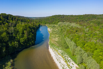 Aerial view of Isar river with two forests around and shore