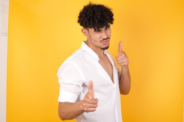 Hey you, bang. Joyful and charismatic good-looking emotive woman with blond curly haircut winking...