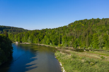 Isar river shore full of nature and forest south of Munich