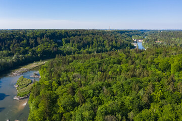 Fototapeta premium Aerial view of German forest and Isar river flowing to Munich from the Alps.