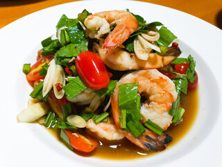 Thai style prawn salad. It's sour, salty, spicy and little sweet at the same time.
