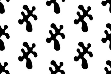 Seamless texture. Black spot on a white background.