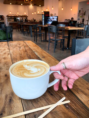 Coffee Mug with Latte in a Simple Coffee Shop