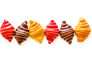 Frame of croissants - fresh bakery on white background