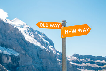 Old way or new way choice text panel with snowy mountain background. Change challenge innovation...