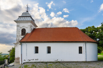 Fototapeta na wymiar Vrsac, Serbia - June 04, 2020: Chapel of St. Cross (serbian: Kapela svetog krsta). The oldest Catholic church in Banat and built from 1720 to 1728.