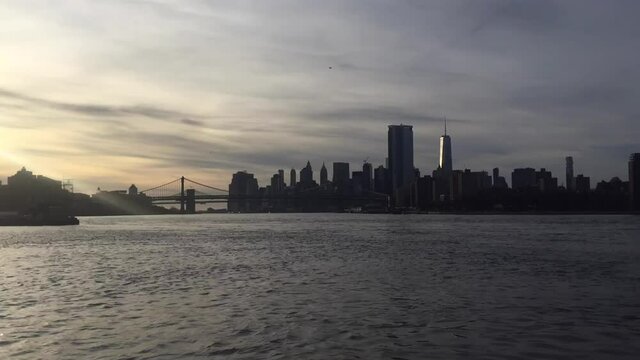New York, USA - downtown Manhattan New York skyline skyscrapers  from ferry approaching city.  time lapse stock video footage clip