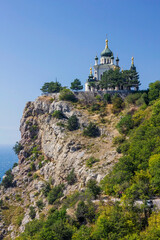 Fototapeta na wymiar Temple in the clouds. Church Of The Resurrection. White temple. Temple on the rock. Crimea. Foros.
