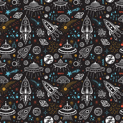 Naklejka premium Space Background for Kids. Vector Seamless Pattern of Hand drawn Doodle Cartoon Rockets, Planets, Stars, Comets and UFOs. 