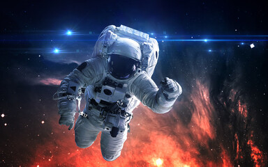 Obraz na płótnie Canvas Astronaut in outer space. Spacewalk. Elements of this image furnished by NASA