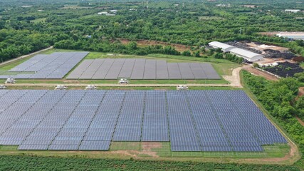 Solar energy farm. Aerial view of a solar farm in Asia.
