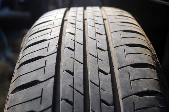 black rubber car tire close up