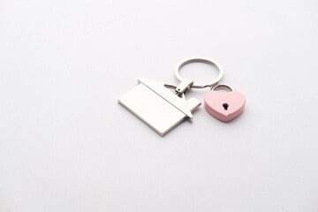 home keyring on white background, close up.