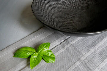 basil leaf and food photography plate and linen props 