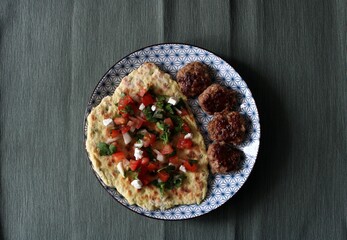 Pita Bread with Grilled Beef Meat and Fried Potato Covered Sesame Seeds. Roasted Meal