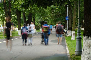 Unrecognizable people on a busy sidewalk in Bucharest, Romania, after Coronavirus (Covid-19)...