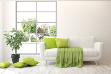 White stylish minimalist room with sofa and summer landscape in window. Scandinavian interior design. 3D illustration