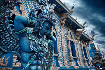 Fototapeta premium Statue of angel near Blue Temple in Chiang Rai, Thailand