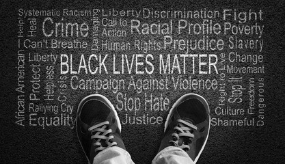 Black Lives Matter Word Cloud on Asphalt Concept of Fighting Racism