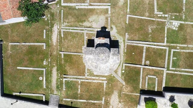 Croatia, church of Holy Cross and archaeological site in old town of Nin in Dalmatia, popular tourist destination, drone overhead view