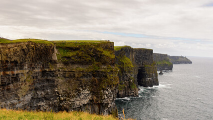 Cliffs of Moher (Aillte an Mhothair), edge of the Burren region in County Clare, Ireland. Great touristic attraction
