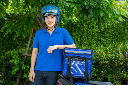 Young Asian Man With Delivery Box, Motorcycle Delivering Food Express Service Concept.