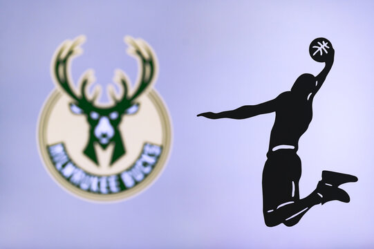 NEW YORK, USA, JUN 18, 2020: Milwaukee Bucks basketball club logo, silhouette of jumping basket player, sport photo NBA, edit space.