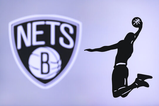 NEW YORK, USA, JUN 18, 2020: Brooklyn Nets basketball club logo, silhouette of jumping basket player, sport photo NBA, edit space.