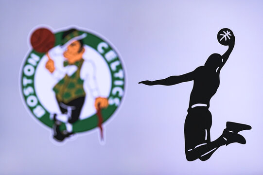 NEW YORK, USA, JUN 18, 2020: Boston Celtics basketball club logo, silhouette of jumping basket player, sport photo NBA, edit space.
