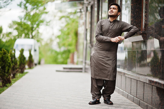 Indo pakistani man wear traditional clothes achkan or sherwani.