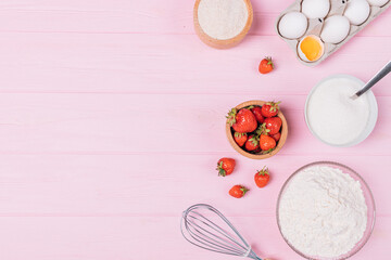 Strawberry pie baking ingredients and kitchen utensils