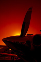 
airplane propeller with sunset