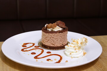 Personalized chocolate cake with whipped cream