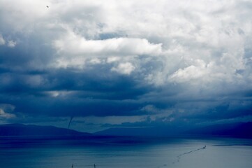 storm clouds over the sea.Tornado forming over sea.