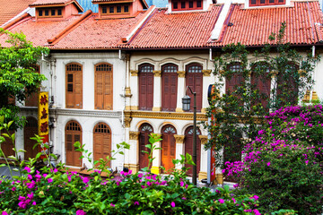 SINGAPORE - NOVEMBER 14: Singapore heritage buildings in Chinatown against the new skyscraper as backdrop taken on November 14, 2013