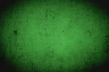 Dirty creepy basement wall in green with dark vignette.