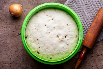 Macro image of bread dough. We bake the bread step by step. Sourdough white flour. Homemade dough.
