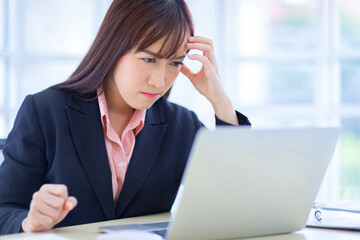 Beautiful Asian women have job stress in office. Asian business women, employee, and office staff...