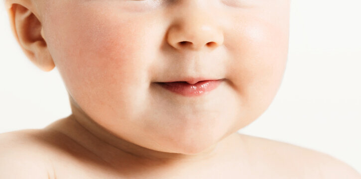 Cropped photo of baby mouth